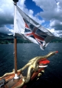 Flag and figurehead on boat