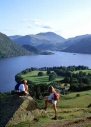 Young female fell-walkers looking over Ullswater