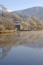 Ullswater in winter sun with hoar frost and snowy hills